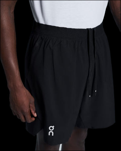 ON RUNNING PANTALON CORTO CORE 7" BLACK